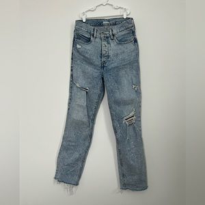 Extra high rise straight light wash distressed jeans. Raw hem.